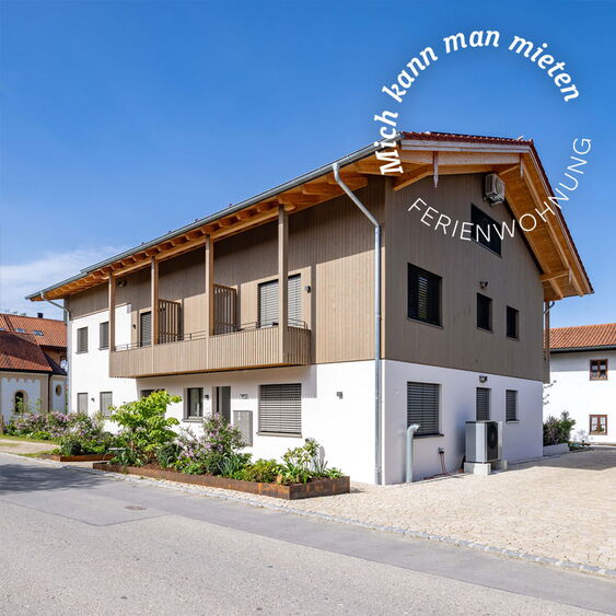 Mehrfamilien-Holzhaus in Holzständerbau in Übersee