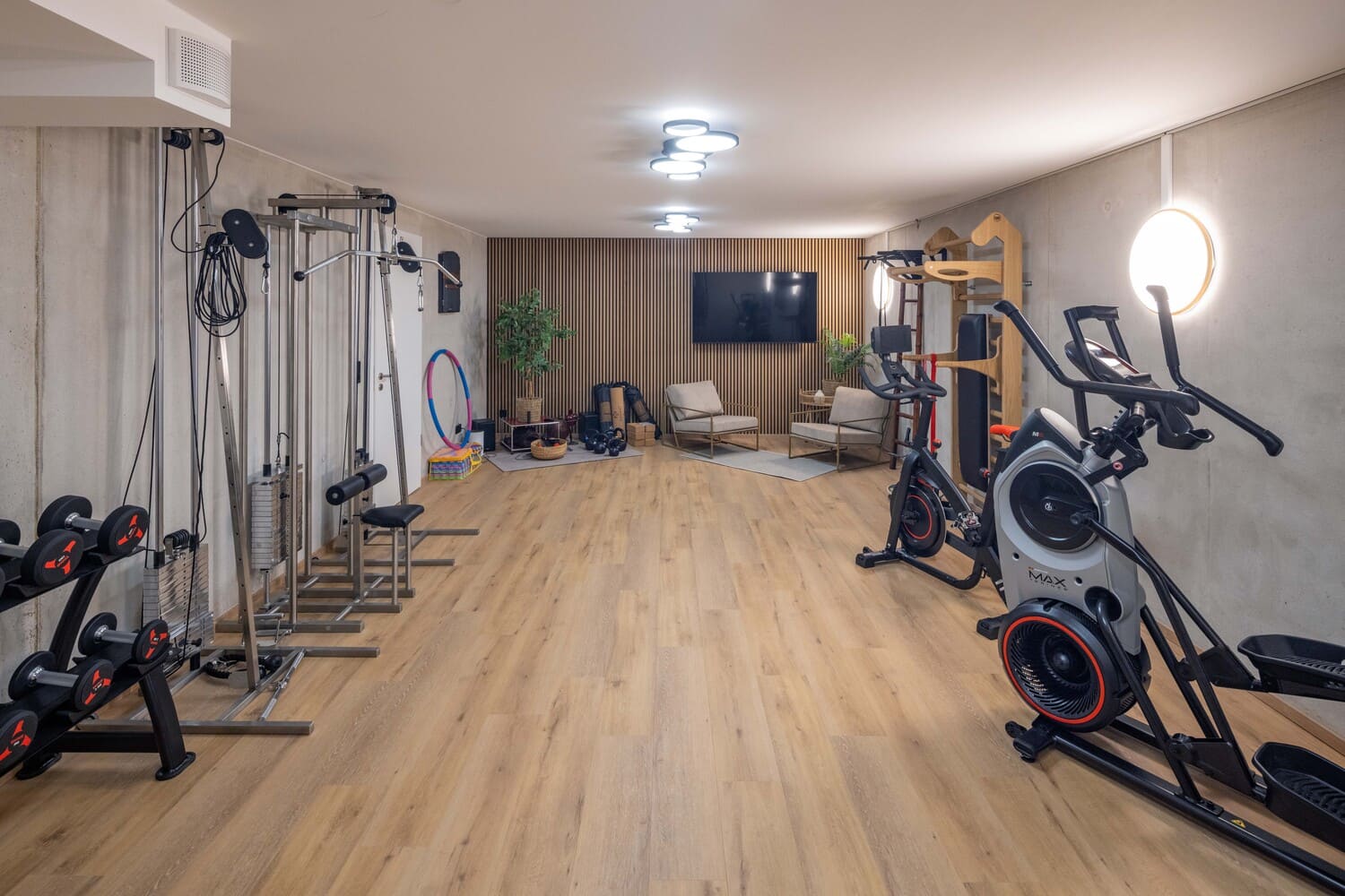 Mehrfamilien Holzhaus in Übersee, Fitnessraum